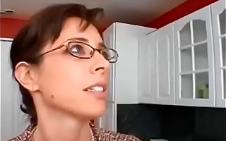 Milf follando en la cocina