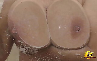 Pressed my breasts compete all over the glass and then masturbate all over a stream of water